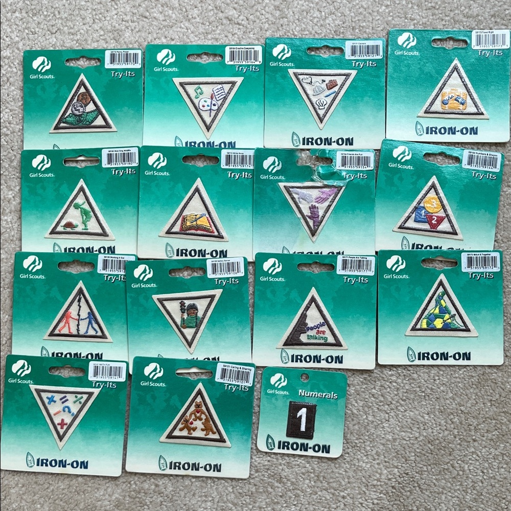 Girl scouts New iron on patches in package.
